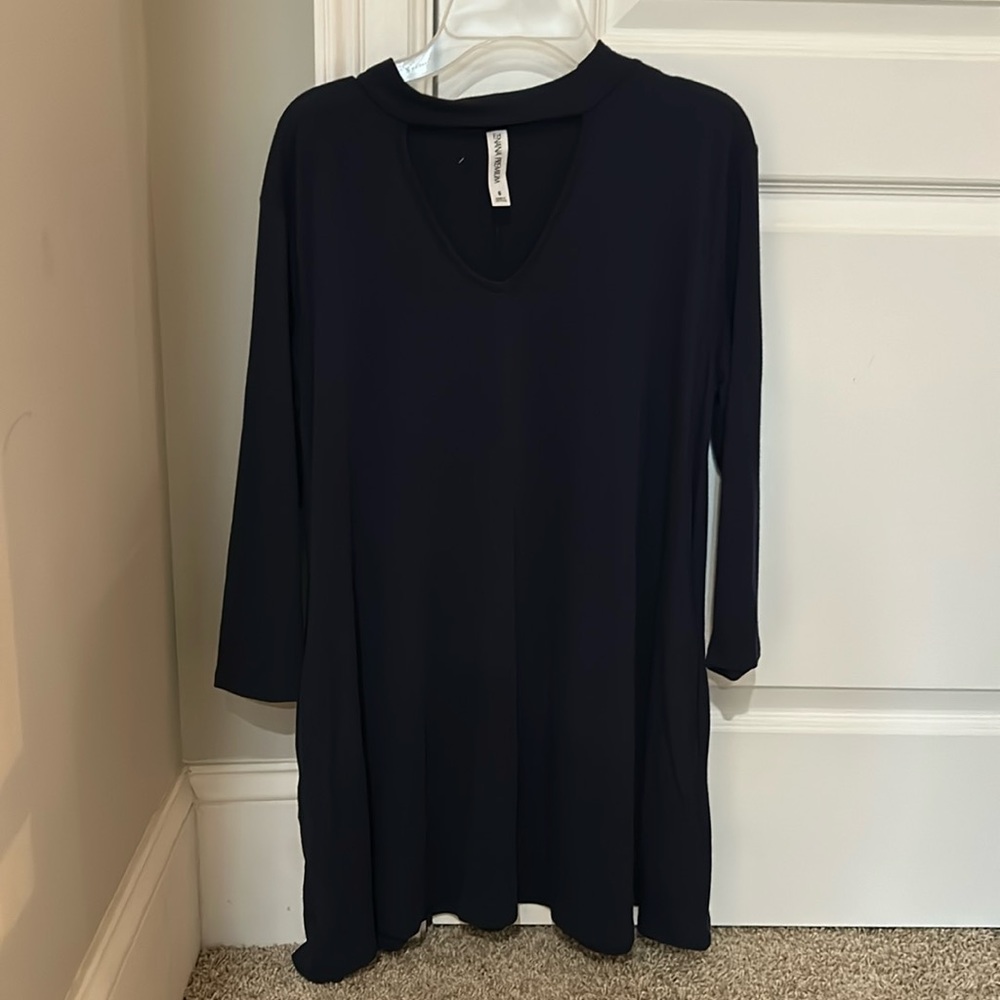 Woman’s navy blue tunic with pockets size small